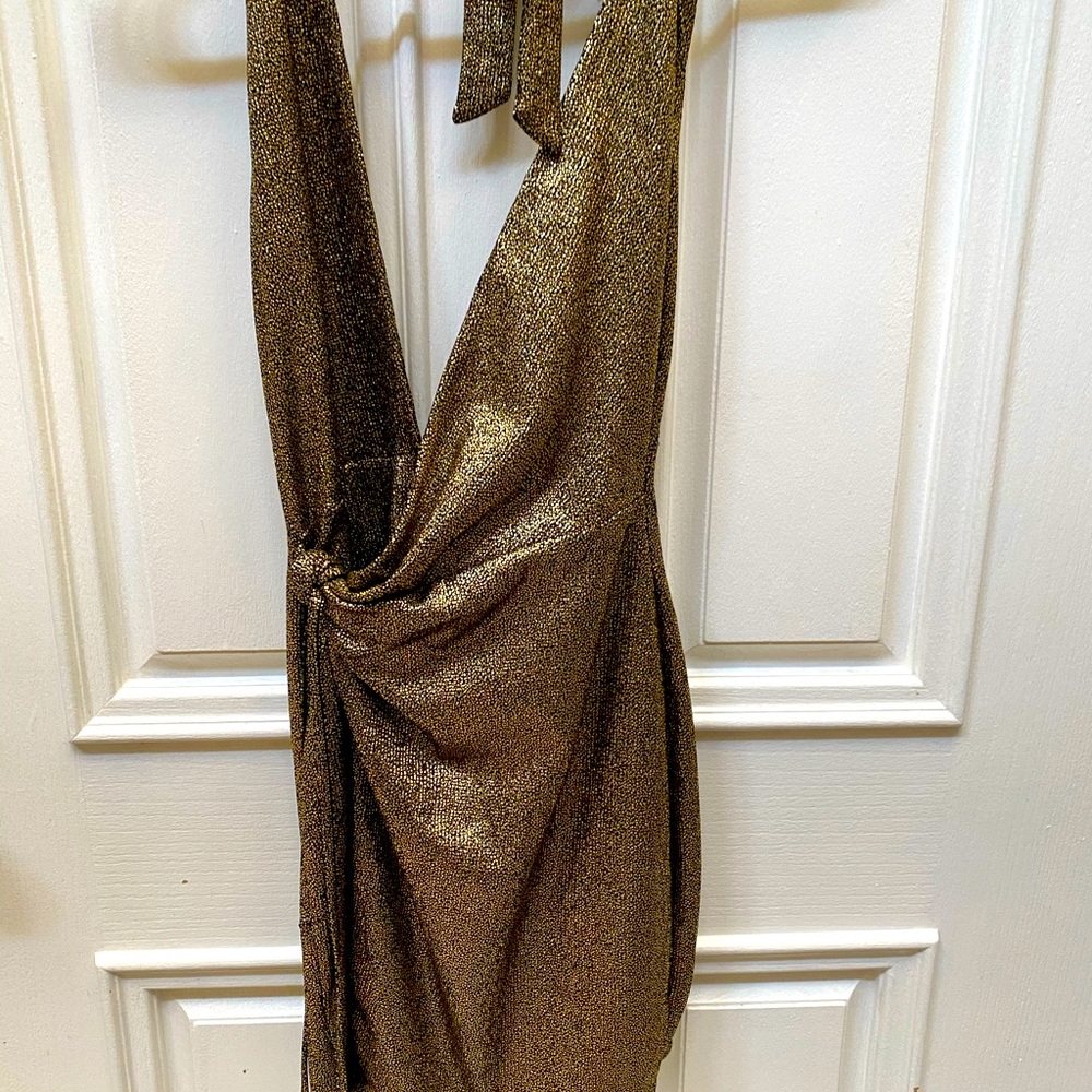 Wore once sharp sexy dress. Low front open back. Holidays